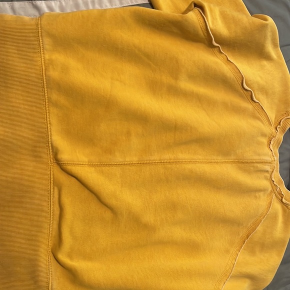 It’s a mustard yellow sweatshirt, it is a size small, the brand is Roxy. - Picture 2 of 2